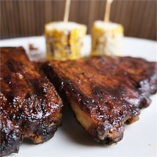 {{photo.Alt || photo.Description || 'Свиные ребрышки  BBQ'}}
